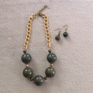 One of a kind chunky beaded necklace with matching earrings.